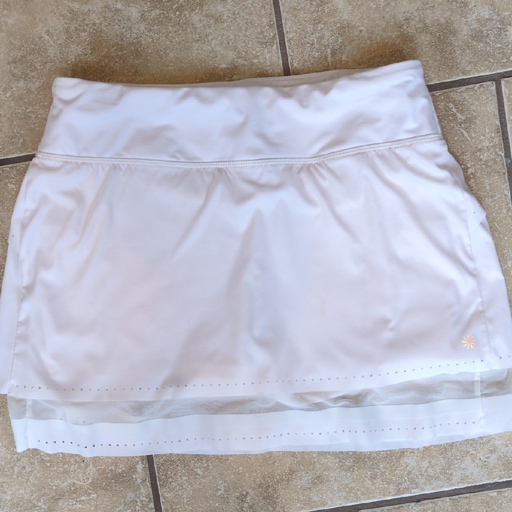 Athleta White Tennis Skort, specifically a‎ style featuring a sheer mesh layer